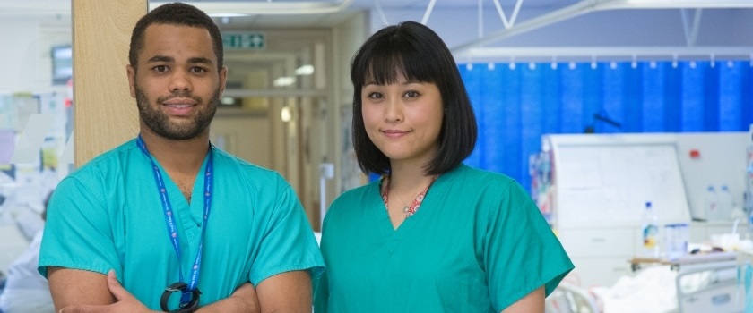 A photo of two doctors in a hospital