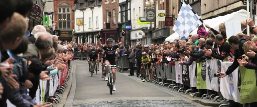 Cyclist riding through Shrewsbury