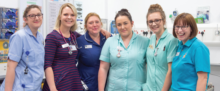 A photo of a group of hospital staff