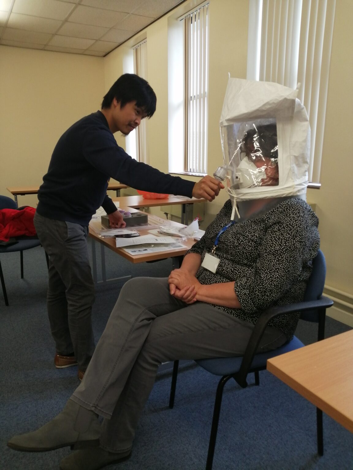 SaTH training external healthcare professionals on how to fit face