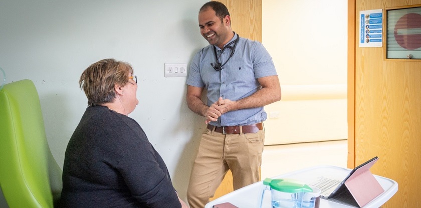 A doctor talking to a patient