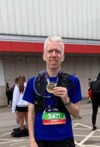 Robert Wright holding his medal