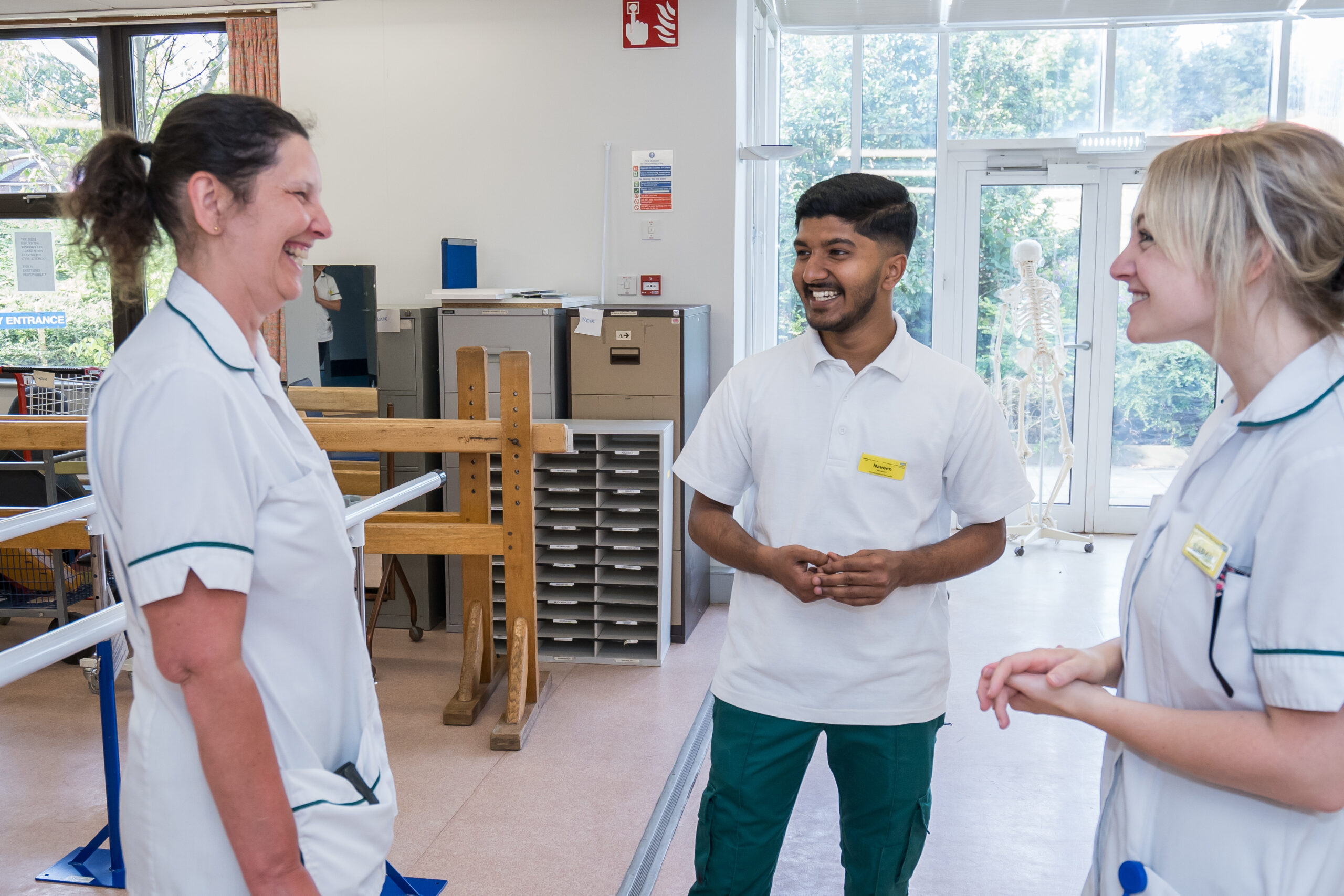 A group of staff talking with each other