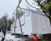 An MRI scanner being lifted into place
