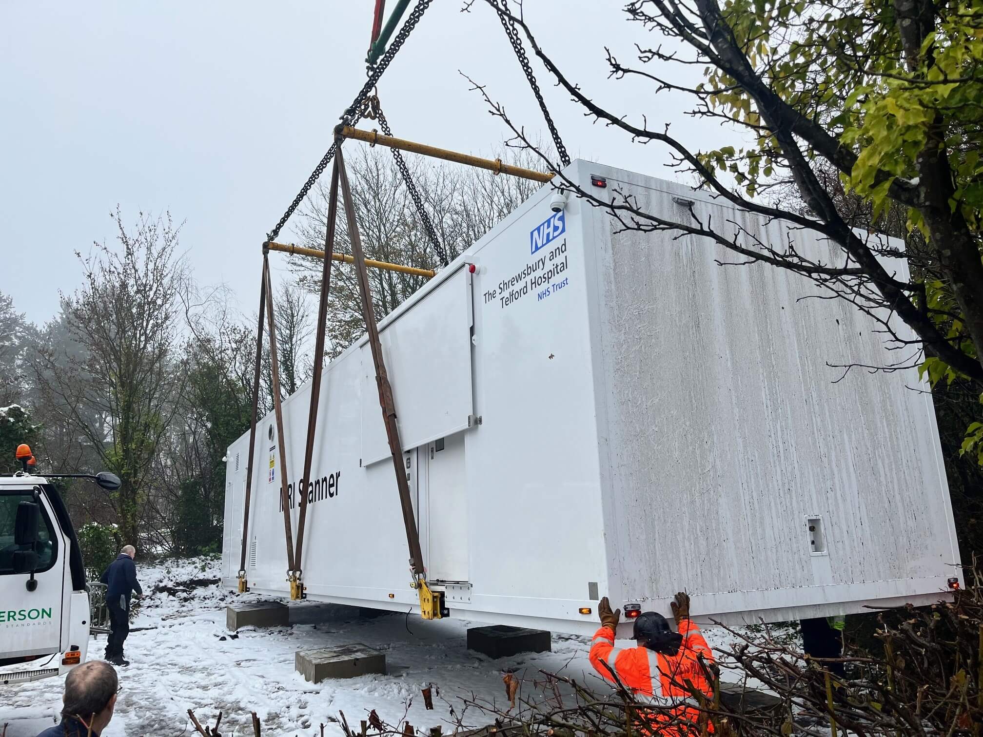 An MRI scanner being lifted into place