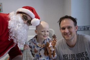 Santa with Piper Richards and dad Duncan Richards at the Children’s Unit 