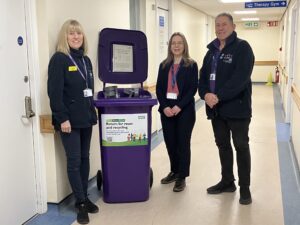 Volunteers Rebecca Barker and Paul Baskerville with Marie Devitt