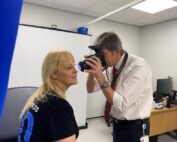 Professional Clinical Photographer taking a close up image of patients cheek