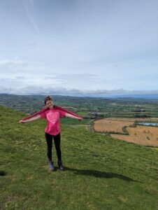 Image of Alice Shingler on the top of a mountain