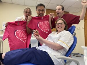 Image of the Orthodontic and Oral and Maxillofacial Surgery team looking very excited about their upcoming Mud Run