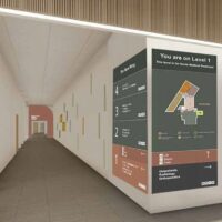 sq wayfinding FG graphic A directory board mounted on wall on either side of corner junction