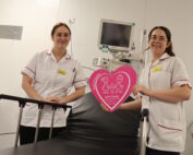 Cardiology staff stood next to the stretcher