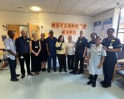 Maureen Drakeley with her surgeon and the rest of the team