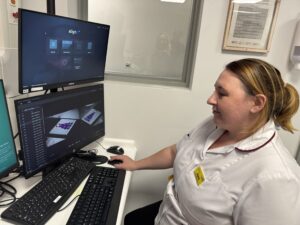 Jayne Matthews, Therapeutic Radiographer, reviewing a mock radiation dose