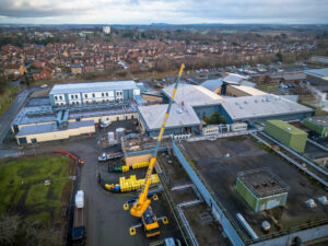 Aerial view of pump being lifted