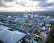 Aerial view of pump being lifted