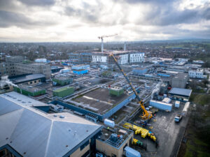 Aerial view of pump being lifted