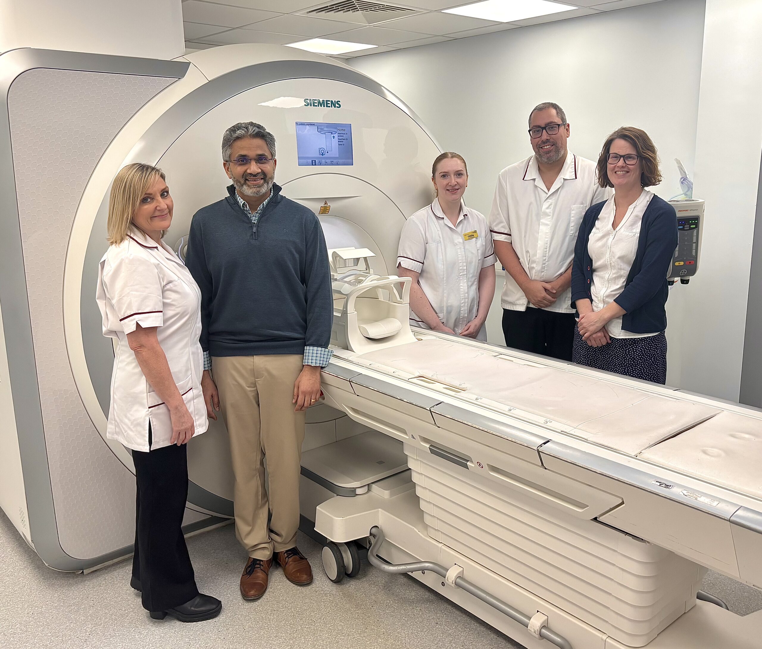 Members of the Radiology and Cardiorespiratory teams at SaTH with the MRI scanner at RSH