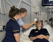 An image of Staff Demonstrating the Pupilometer